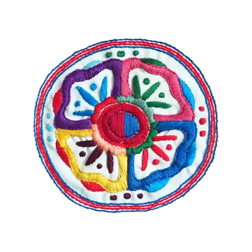 Family sharing mandala art coloring pages during a mindful evening